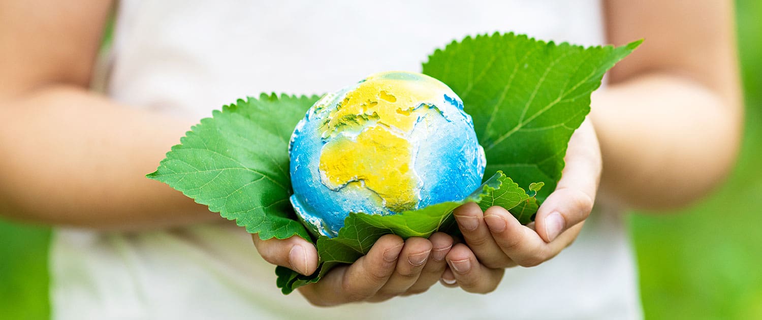 little-girl-holding-small-planet-in-hands-against-2026-03-11-02-11-39-utc_NVT